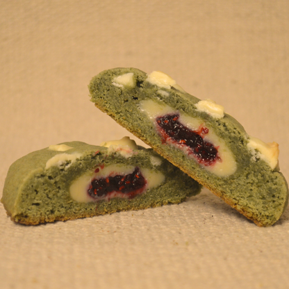 matcha cookie filled with white brigadeiro and raspberry jam